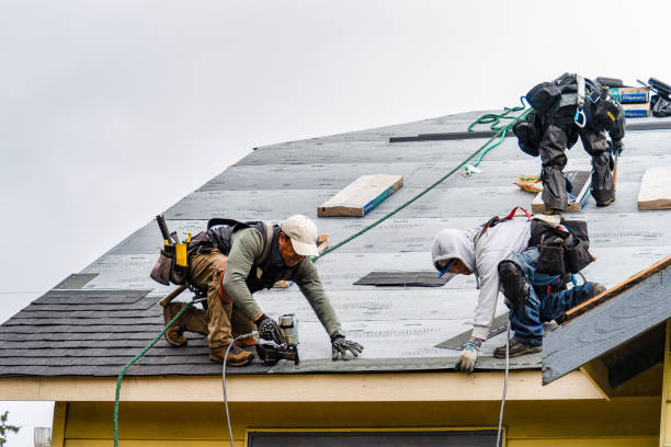 Professional Gutter Installation technician working in Moores Hill, IN